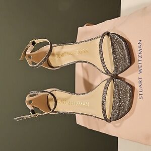 STUART WEITZMAN NUDISTCURVE SANDALS